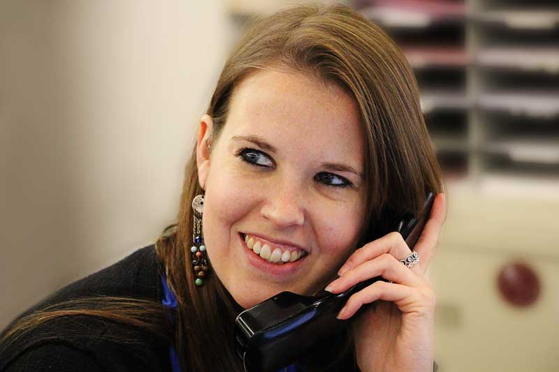 Girl speaking on phone and smiling