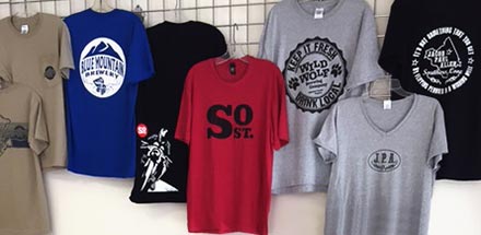 Virginia brewery shirts for sale on wall