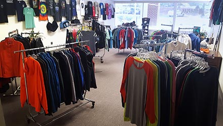 Embroidered clothing on display