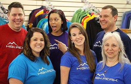 High Peak logo on sign at storefront