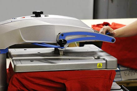 Heat press curing a direct to garment print