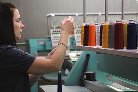 Thread bobbins on machine
