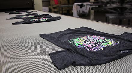 Custom printed shirts on dryer